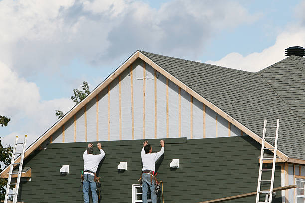Professional Emergency Siding Repair technician working in Manchester, VA